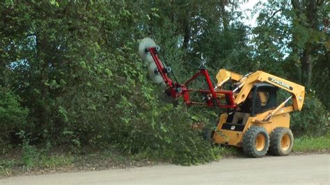 skid steer tree cutting|tree trimmer attachment for tractor.